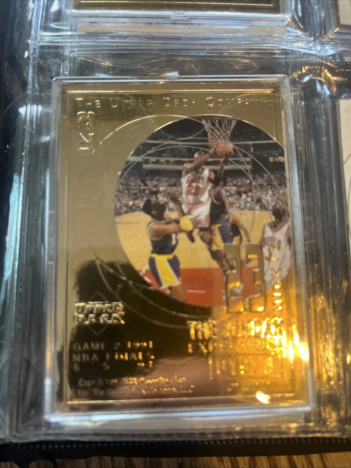 1996-97 UD 23 Nights The Jordan Golden Experience Set (12 cartas + carpeta) Foto 3 de 4