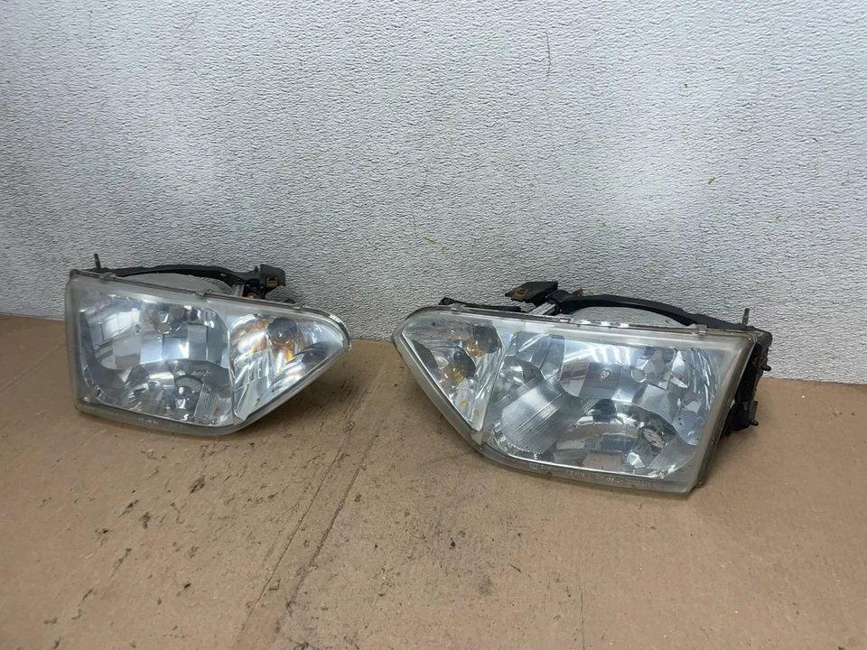 Faros laterales izquierdo+derecho Nissan Quest 2001 a 2002 Q4876 DW Foto 2 de 4