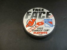 1997 STANLEY CUP PLAYOFFS FACE TO FACE N.J. DEVILS  VS N.Y. RANGERS HOCKEY PUCK 