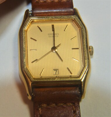 Seiko women's Quartz Date gold color Watch 2A22-5210 leather band