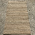 Natural, sustainable 100% jute rug with woven sewn ends, 135cm x 75cm 
