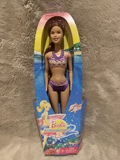 NIB BARBIE DOLL A MERMAID TALE BIKINI BRUNETTE W/ PURPLE STREAK 2011 W2899