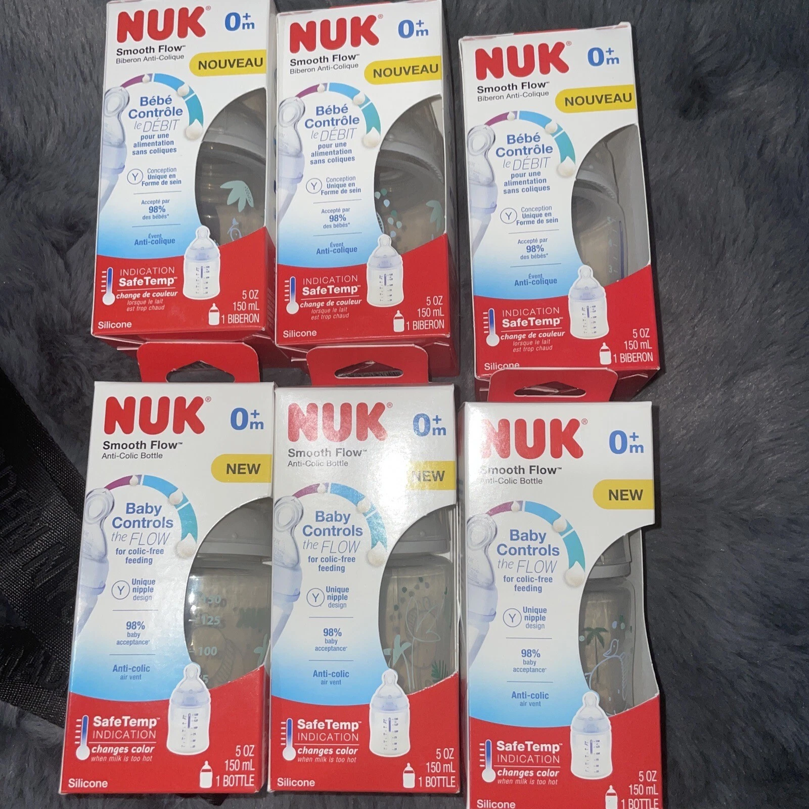 NUK Smooth Flow Anti-Colic Bottle, 5 oz Chnages color when the milk is too hot!!