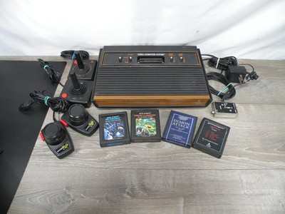 Atari 2600 Video Computer System Console Lot with 2 Joysticks, 2 Paddle 4 Games