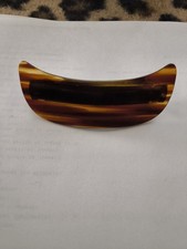 The item in your image is a vintage-style tortoiseshell barrette, likely made of