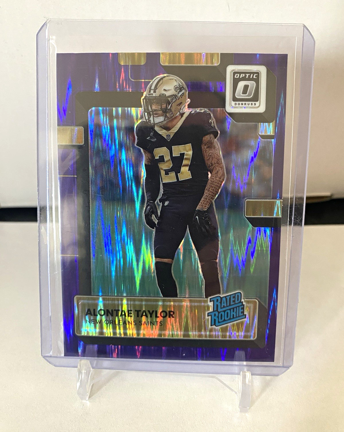 Panini 2022 Donruss Optic Alontae Taylor #300 Rated Rookie Purple Shock Prizm