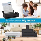 Black Fujitsu ScanSnap ix1300 document scanner with 30ppm, 600dpi, and security features, positioned in front of a hybrid cloud brochure.