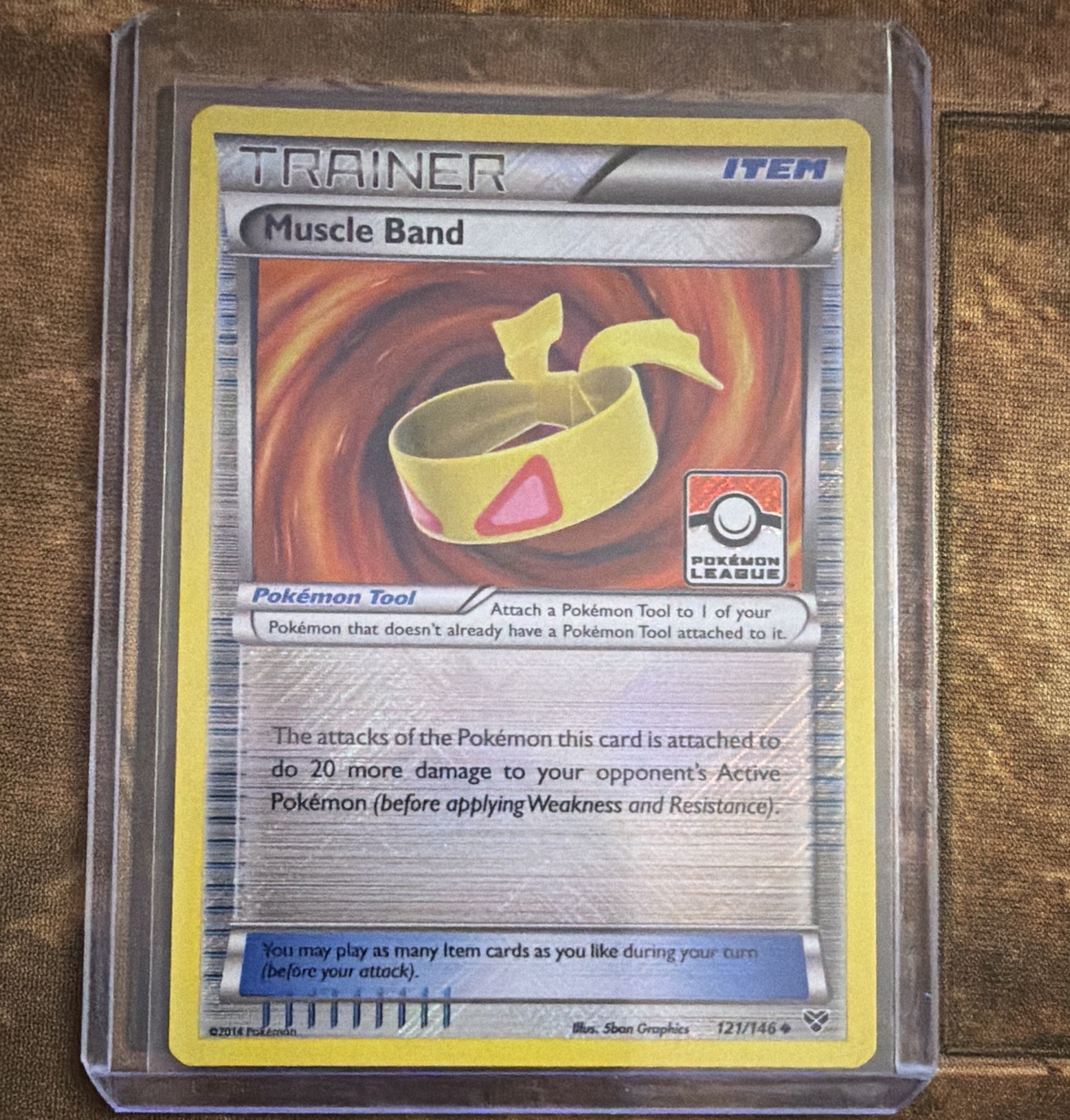 Pokemon TCG Muscle Band 121/146 League & Championship Reverse Holo Promo ENG
