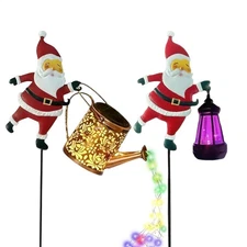 1x Christmas Solar Garden Light Santa Claus Holding Watering Can/Lantern Light