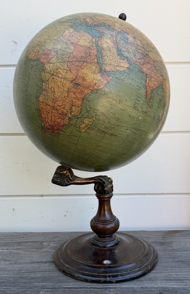 An antique Chas M. Williams index globe at $395 — a true collector's artifact with provenance, not just a prop.