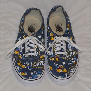 white and black platform vans