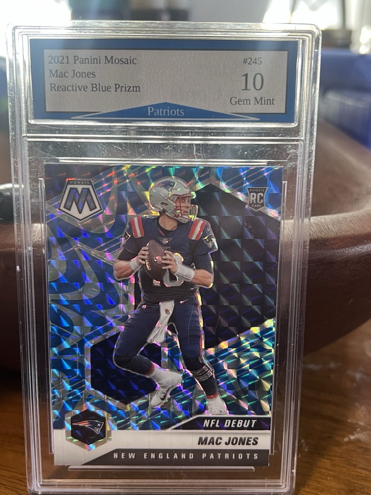 2021 Panini Mosaic - NFL Debut Mac Jones #245 Reactive Blue Mosaic Prizm (RC)