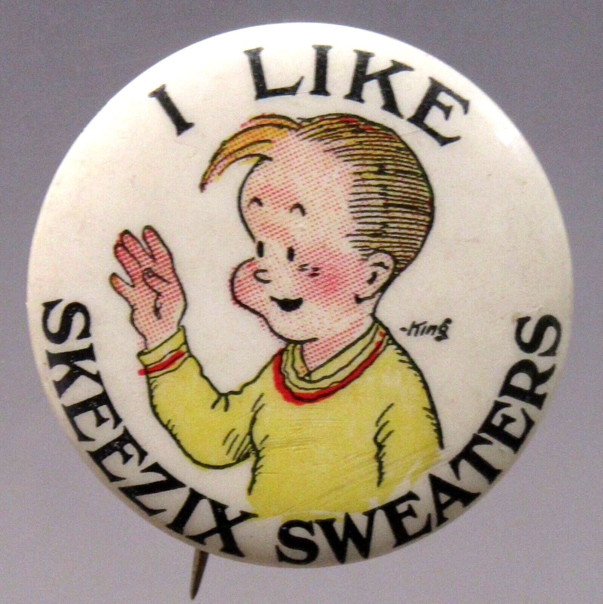 1930's I LIKE SKEEZIX SWEATERS comic strip advertising pinback