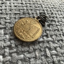 1900s Metal Biblical Charm Northern Publishing House Belfast 3/4”