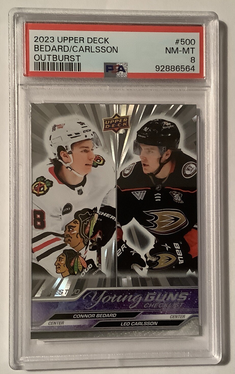 2023-24 Connor Bedard Leo Carlsson Young Guns #500 Outburst PSA 8 