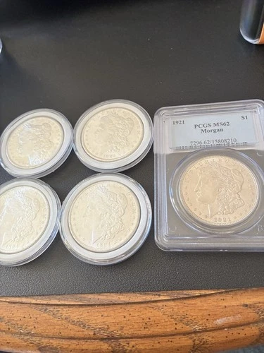 1884 CC Morgan Silver Dollars, 4 Coins Total. And 1921 PCGS MS62 Slab.