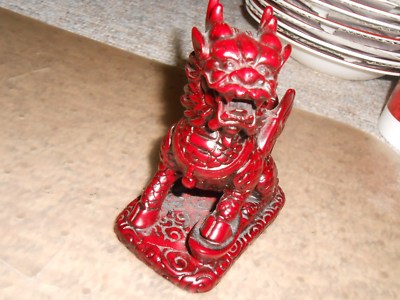 red chinese dragon 5 inches tall on 2 inch by 4 1/4 inch base