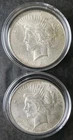 Two 1923 $1 Peace Silver Dollars in Capsules