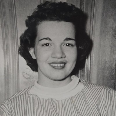 Vintage B&W Photo Snapshot of a Close Up of Young Woman Smiling