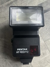 Flash Pentax AF-400FTZ montage sur chaussures pour reflex Pentax