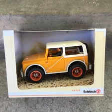 NIB SCHLEICH 42025 Car Suv 4x4 Vehicle Yellow Driver Wheels Germany