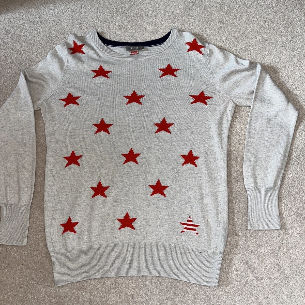 Oasis star jumper sale