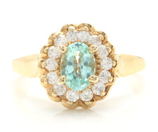 0.87 Carat Natural Paraiba Tourmaline and Diamonds in 14K Solid Yellow Gold Ring