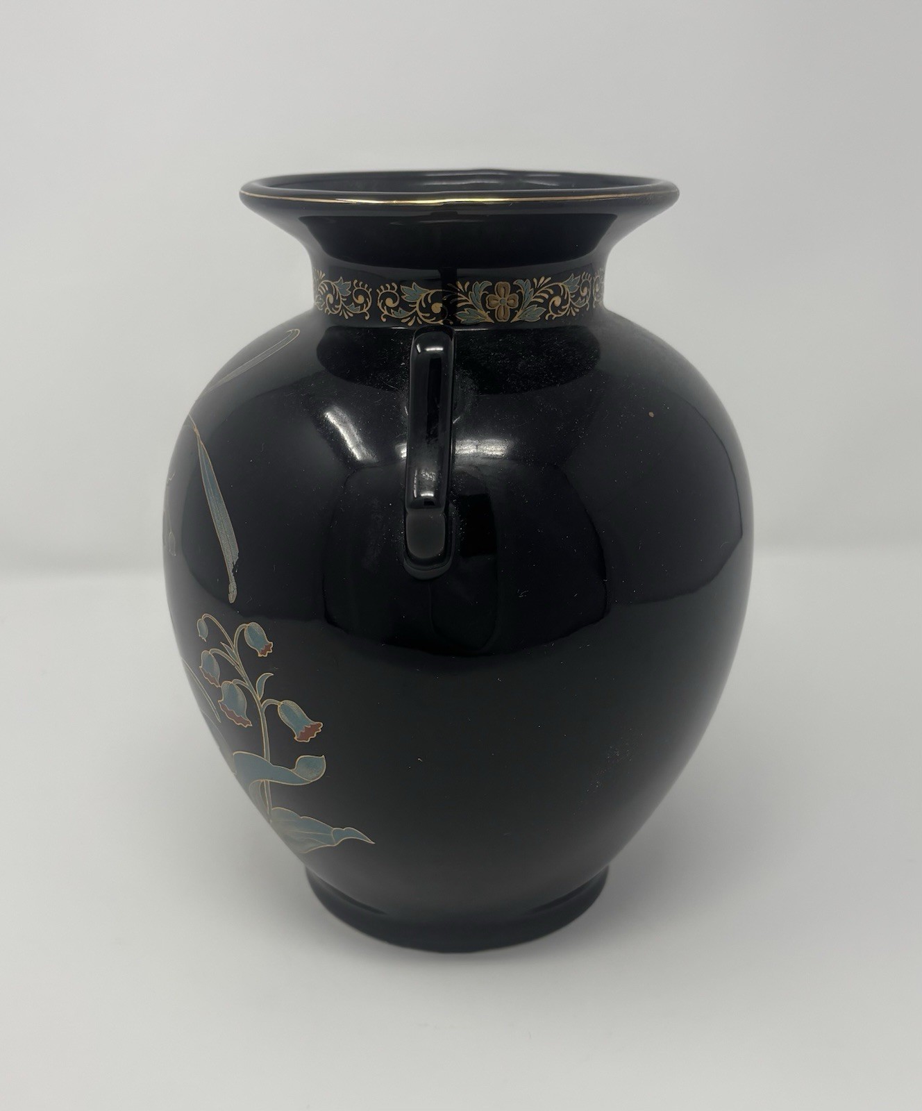 Ornate Black Japanese Vase with Floral Detailing and Gold Accents