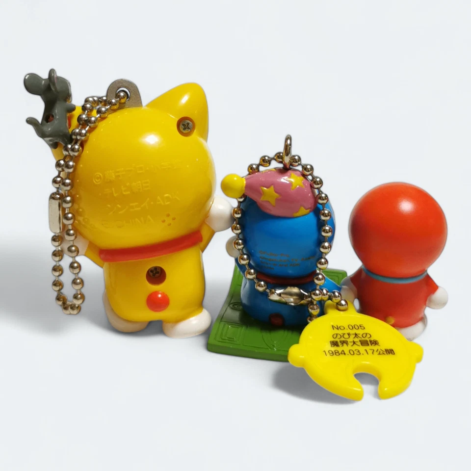 DORAEMON 1.5" Mini Figura LLAVERO ENCANTO Ojos Torcidos Juguete Coleccionable Lote de 3 Foto 2 de 2