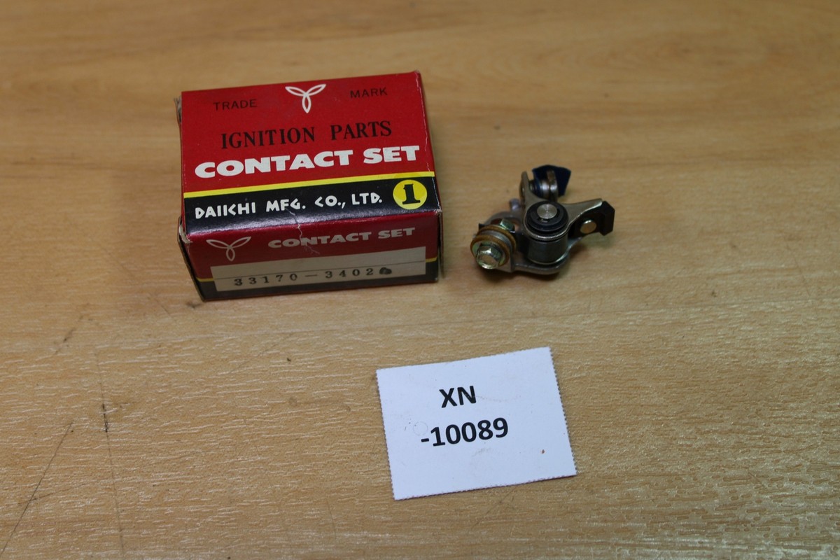 mir.  Daiichi 33170-34020 Unterbrecher Contact Set NOS NEU genuine