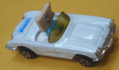 Fun Vintage Champion Auto Stores Champman Mascott in Ertl Diecast Corvette 1980s