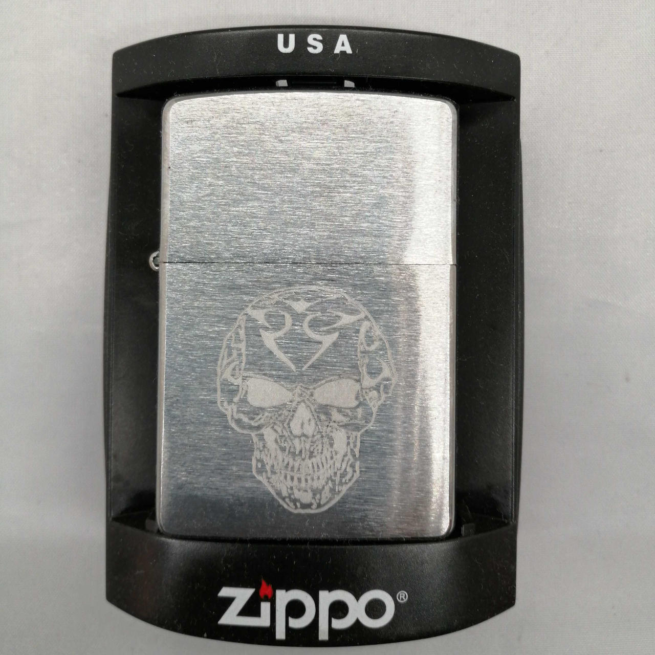 Zippo lighter skull design horror carving design made in 2006 unused