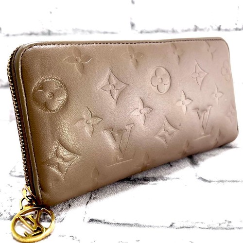 Louis Vuitton Monogram Embossed Leather Zippy Wallet Taupe