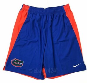 nike woven shorts orange