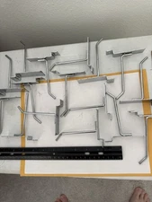 New Qty (16) Econoco 4” Slatwall Hooks, SW H4