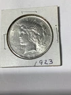 1923 $1 Peace Dollar  Uncirculated. Silver. Breaking high grade set. Lovely.