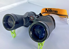 Nikon fixed-focus 7x50 binoculars, Nikon strap Soft Case. Japan.