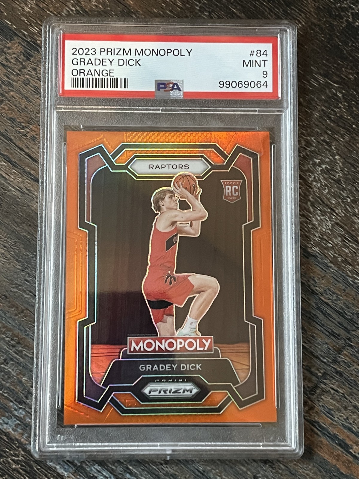 2023-24 Prizm GRADEY DICK RC Orange /124 Monopoly 84 Raptors Rookie PSA 9 Mint