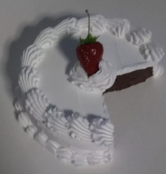 Fake Food White Icing on Chocolate Slice out Cake with Strawberry