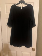 Description: Elegant and versatile Connected Apparel dress black