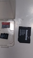 SanDisk 8GB Micro SD With a 4gb MicroSd card