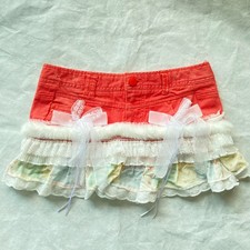 Minigonna in denim corallo con pelliccia e volant patchwork (donna XS)