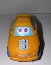 TONKA MINI CHUCK & FRIENDS ORANGE VEHICLE CAR TOY FIGURE 1:64 SMILING FACE