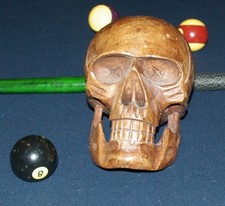 Life size carved hardwood skull