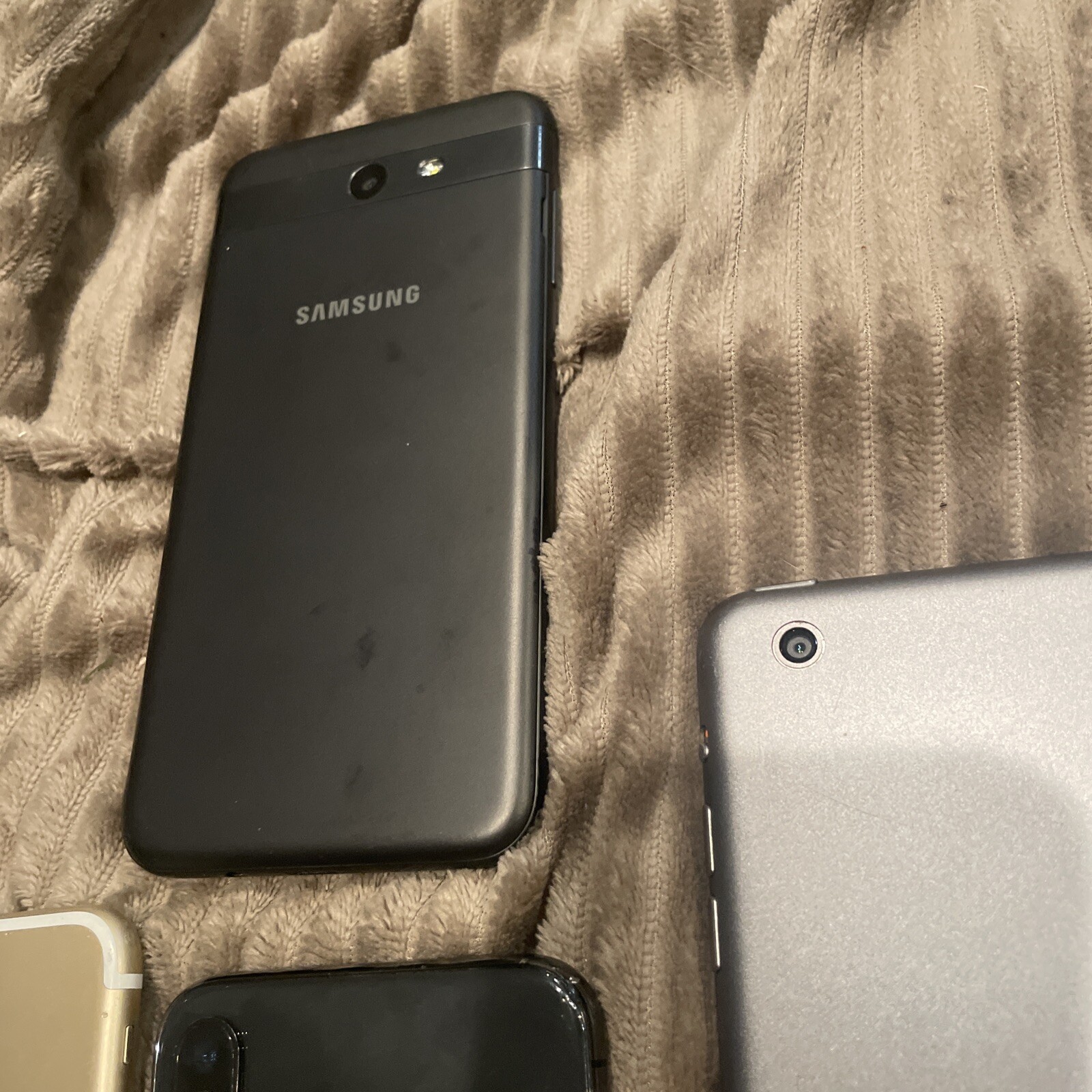 Lot Of Two iPhones One iPad And Samsung Phone For Parts or Repair