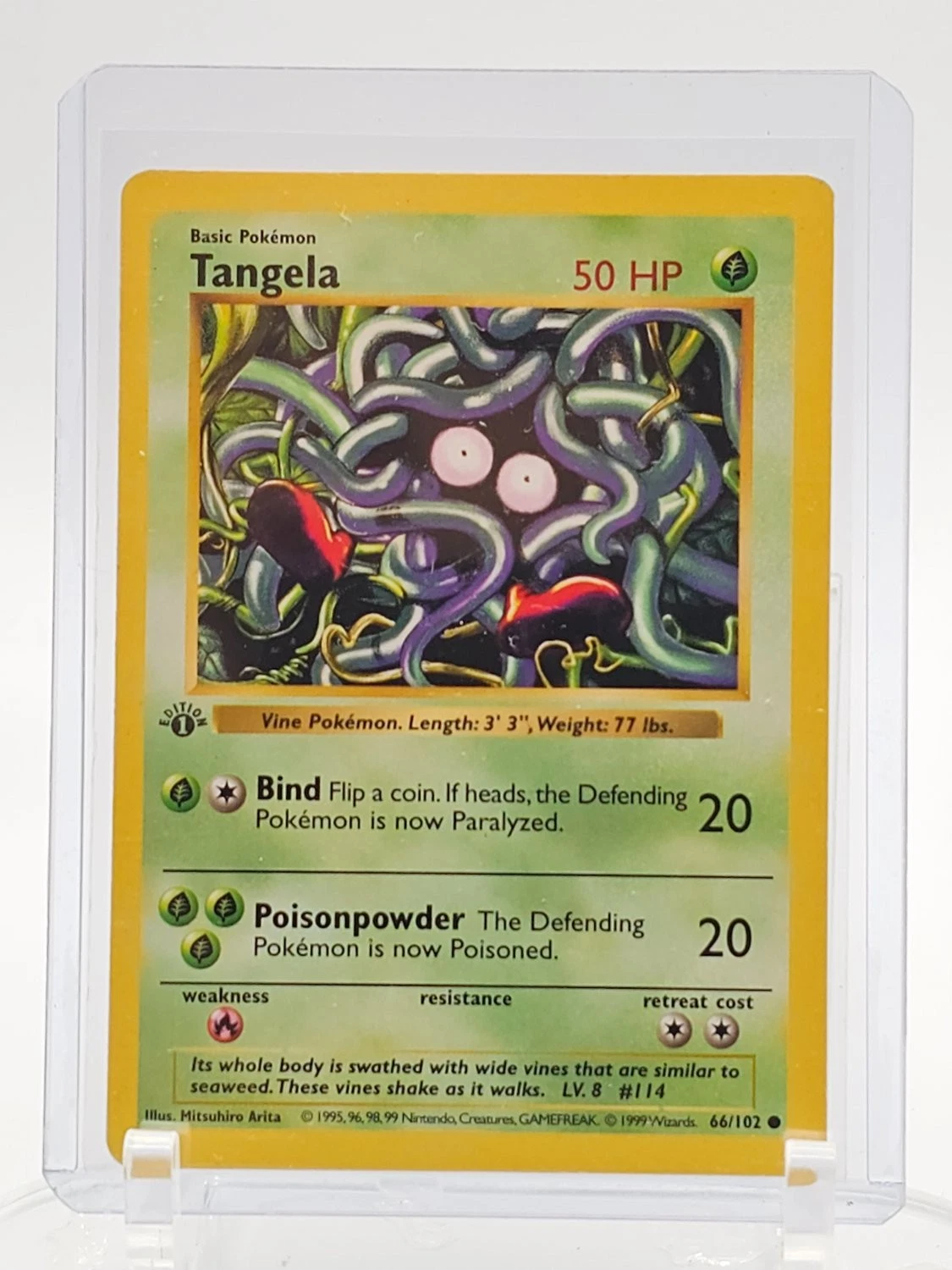 A Pokemon card in a protective sleeve