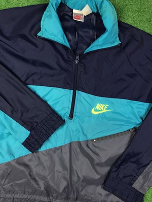 turquoise nike windbreaker