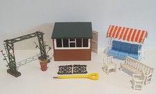 BRITAIN'S FLORAL GARDEN SHED WITH TOOL RACK, HAMMOCK, ROSE TRELLIS, BENCH etc.