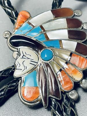 ONE OF THE MOST DETAILED VINTAGE NAVAJO TURQUOISE STERLING SILVER CHIEF BOLO TIE