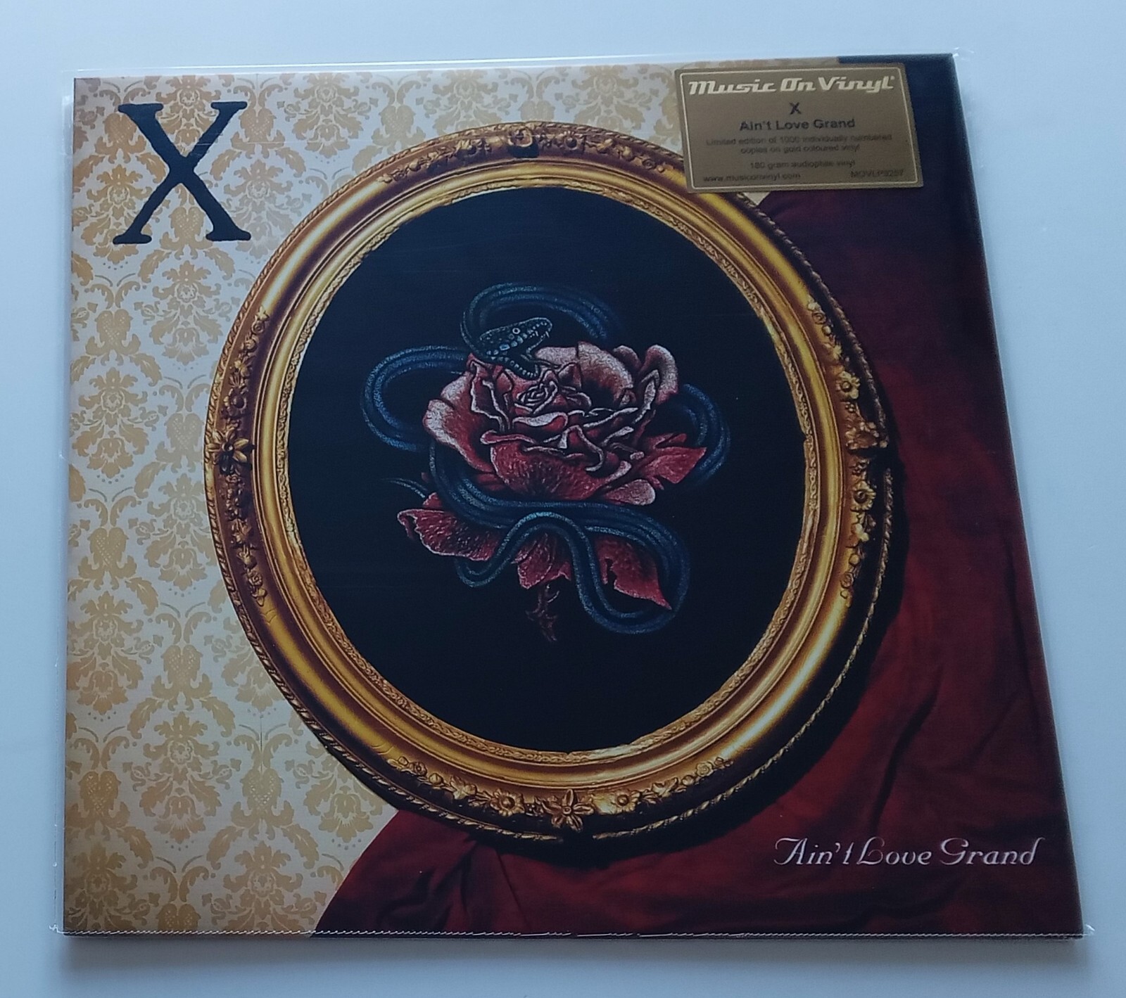 X - Ain't Love Grand UK 2023 LTD MOV Numbered Gold Vinyl LP *Sealed*